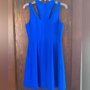 Women’s CeCe royal blue dress with chest cutout details. Size 2. Fully lined.